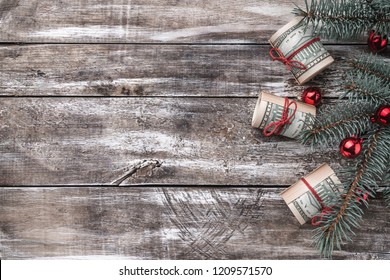 Xmas Background Of Old Wood. Christmas Tree With American Money.