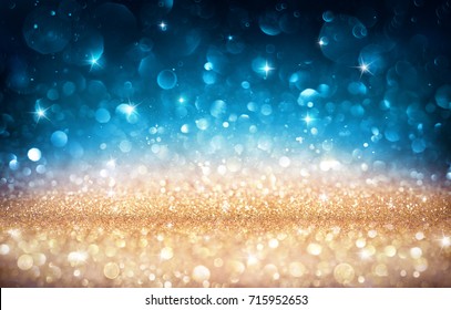 Xmas Shiny Background - Glittering Effect With Golden And Blue Bokeh
