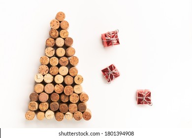 Xmas Tree Made Of Wine Corks With Small Gift Boxes On White Background