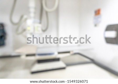 X-ray room blur background of empty radiological imaging scan equipment laboratory in blurry medical clinic or general hospital in radiology department
