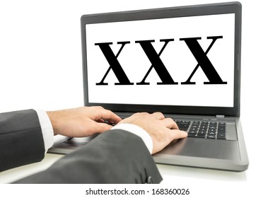 XXX written on laptop monitor on white background. Porn concept.