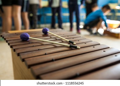 Xylophone And Drumsticks In A Music Class With Children