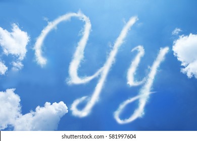 Y Clouds Font Calligraphy Style ,hand Written On Sky Background. 