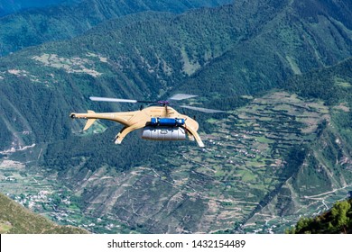 YaAn, Sichuan / China - Drone Delivery By China Post Seen In The Rural Area Of Sichuan. Drone Is Becoming A Core Strategy For China To Fight Poverty And Expand ECommerce.