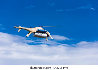 YaAn, Sichuan / China - Drone Delivery By China Post Seen In The Rural Area Of Sichuan. Drone Is Becoming A Core Strategy For China To Fight Poverty And Expand ECommerce.