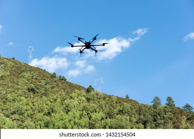 YaAn, Sichuan / China - Drone Delivery By China Post Seen In The Rural Area Of Sichuan. Drone Is Becoming A Core Strategy For China To Fight Poverty And Expand ECommerce.