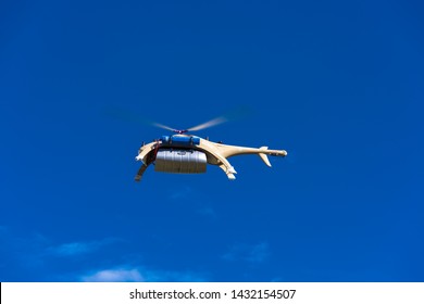 YaAn, Sichuan / China - Drone Delivery By China Post Seen In The Rural Area Of Sichuan. Drone Is Becoming A Core Strategy For China To Fight Poverty And Expand ECommerce.