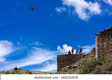 YaAn, Sichuan / China - Drone Delivery By China Post Seen In The Rural Area Of Sichuan. Drone Is Becoming A Core Strategy For China To Fight Poverty And Expand ECommerce.