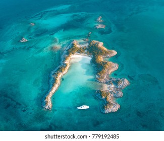 yacht anchored tropical island in the Bahamas 
