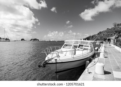 Yacht Boat Anchored At Sea Pier On Tropical Beach In Gustavia, St.barts. Yachting And Sailing. Luxury Travel On Boat. Summer Vacation On Island. Water Transport And Marine Vessel.