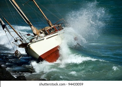 yacht crash on the rocks in stormy weather