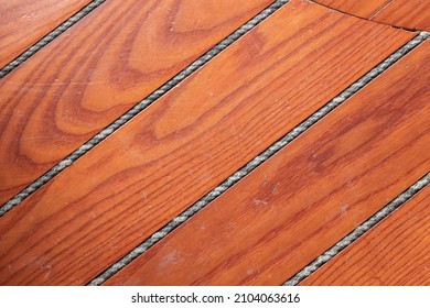 Yacht Deck Made Of Red Wood Planks, Close Up Photo