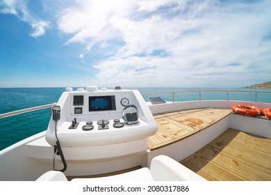 Yacht flybridge open deck, modern and luxury equipped with navigation dashboard devices. Lifestyle freedom concept.