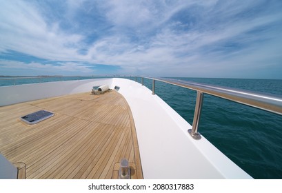 Yacht panorama on deck. Calm sea water at day. Modern and luxury transportation.