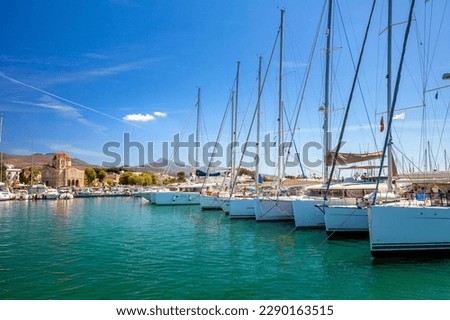 Yacht pier. Yacht marina. Many sailing boats are at the pier. Nice trip around the islands, great weekend getaways and holidays. Greece, Europe.