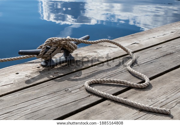 yacht rope on a wood\
surface