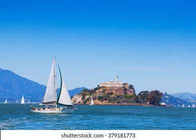 Yacht sail in front of Alcatraz prison island