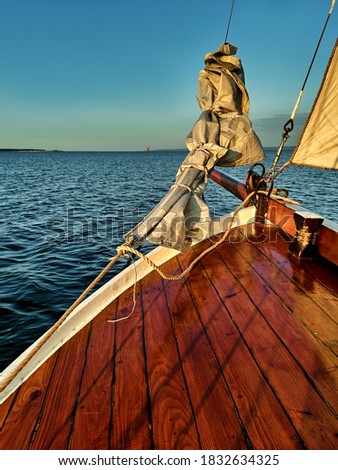 Yacht sailing at beautiful sunset. Zdjęcia stock © 