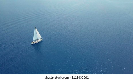 Yacht sailing on opened sea. Sailing boat. Yacht from drone. Yachting video. Yacht from above. Sailboat from drone. Sailing video. Yachting at windy day. Yacht. Sailboat. - Shutterstock ID 1111632362