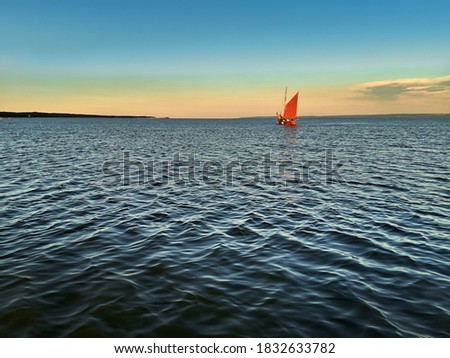 Yacht sailing in Vistula Lagoon at sunset. Zdjęcia stock © 