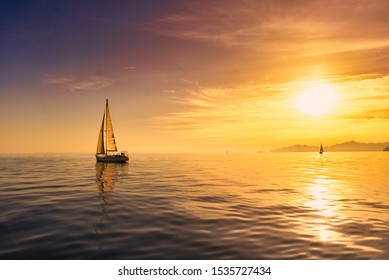 yacht at sunset at sea  - Powered by Shutterstock