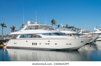 Yachts or boats on a sunny morning in a marina in La Paz Baja California Sur. Mexico. With clear blue summer sky sstkSummer - Powered by Shutterstock