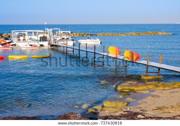 Yachts for rent near pier. Mediterranean Sea coast
of Paphos, Cyprus