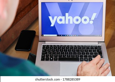 Yahoo is used for business meeting on laptop by man. An illustrative editorial image. San Francisco, US, June 2020.