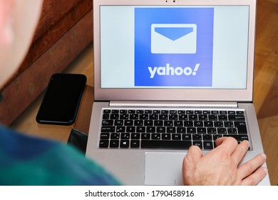 Yahoo is used for business meeting on laptop by man. An illustrative editorial image. San Francisco, US, June 2020.