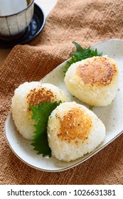 Yaki miso onigiri are rice balls glazed with miso sauce and grilled until golden brown.