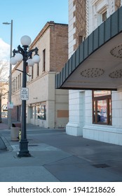 Yakima, Washington, USA, March 22, 2021: Capitol Theatre Entrance Box Office Open Hours Sign Side Walk And Lamp Post