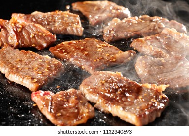 Yakiniku is the food that grille a thin sliced beef and dipped in a soy-bean sauce based sauce