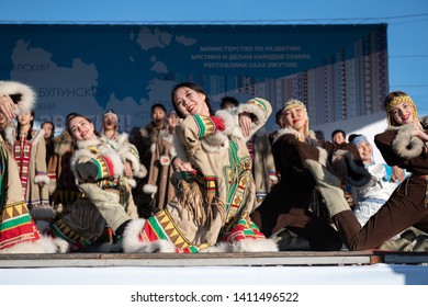 Yakutsk, Yakutia/Russia- May 21 2019: Celebration of a significant event - the inclusion of eight districts of Yakutia in the Arctic zone of Russia. Young dancers  in traditional north dresses 