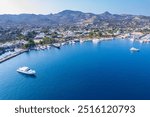 Yalikavak Bay of Bodrum. Mugla, Turkey. Panoramic view of Yalikavak marina and beach. Drone shot.