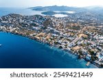 Yalikavak Bay of Bodrum. Mugla, Turkey. Panoramic view of Yalikavak marina and beach. Drone shot.