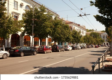 YALTA, UKRAINE - MAY 19, 2020: Small Town Street With Parked Cars