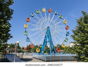 Yalutorovsk, Tyumen Region, Russian Federation - June 13, 2024. Ferris Wheel in the City Garden - Powered by Shutterstock