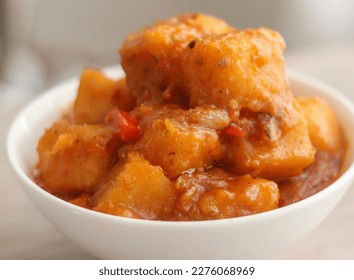 Yam porridge or Asaro is another delicious Nigerian yam dish cooked in a well-seasoned pepper mix until soft and fluffy with some yam chunks.