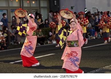 Yamagata City, Yamagata, Japan- August 7, 2022: Two women perfroming a traditional hanagasa dance during the Hanagasa Festival in Yamagata City, Japan. 