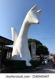 YAMAGUCHI/JAPAN-Sep 26, 2019: Giant White Fox Statue In Front Of Yuda Onsen Station. Close Up.