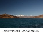 Yamdrok Lake, known as "Yamzho Yumco" in Tibetan, is one of the largest and most beautiful lakes in Tibet, located at an altitude of around 4,441 meters (14,570 feet) above sea level.