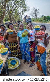 Yamoussoukro, Ivory Coast - January 31,2014: Unidentified African women presenting their vegetables at road market