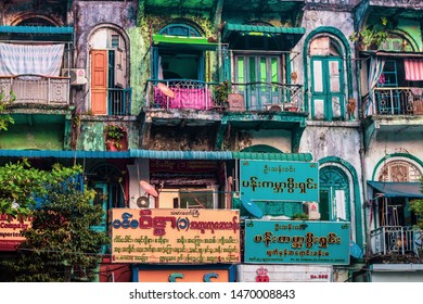 YANGON, MYANMAR - APRIL 05, 2016: Yangon City Hall With People And Markets In Yangon, Myanmar