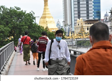 Yangon / Myanmar - July 28 2020: Asian People Wearing Face Masks In Public, COVID-19 Pandemic