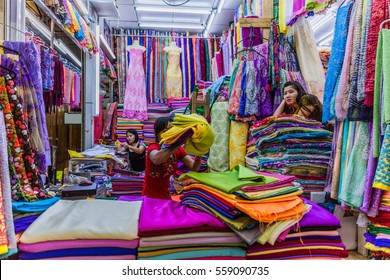 Yangon, Myanmar -November 25, 2016 : Women In A Cloth Shops Stall Of Bogyoke Aung San Market Yangon In Myanmar