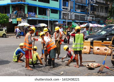 Yangon/Myanmar - Oct 6, 2018 : Road Maintenance Worker In Yangon, Myanmar.