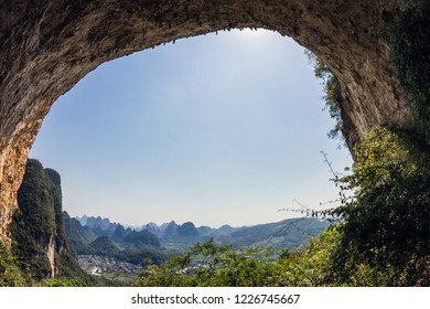 Yangshuo Moon Hill cave detail with the karstic mountains in the background