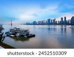 Yangtze River Bridge and skyscrapers along the river, night view of Wuhan, China.