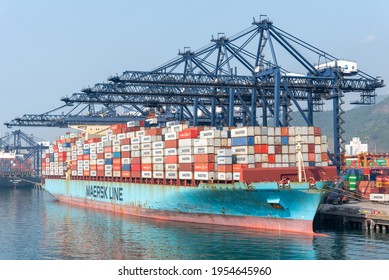  Yantian, China - March 17 2021: cargo container ship "Maersk Stepnica", owned by Maersk, berthed in port of Yantian. She is fully loaded with cargo inside containers, gantry cranes in operation.