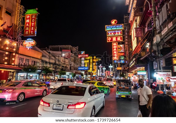 Yaowarat, Bangkok / Thailand - February 11, 2020:\
Traffic jam in Yaowarat Road, tourists are known as China Town or\
Chinatown, night\
photo